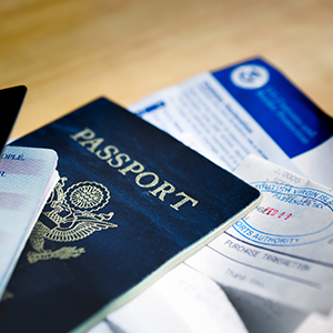 passport, boarding pass, and other important documents to bring when you travel
