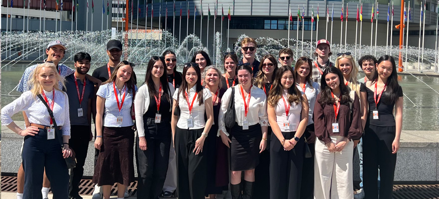 Students standing and smiling in Vienna