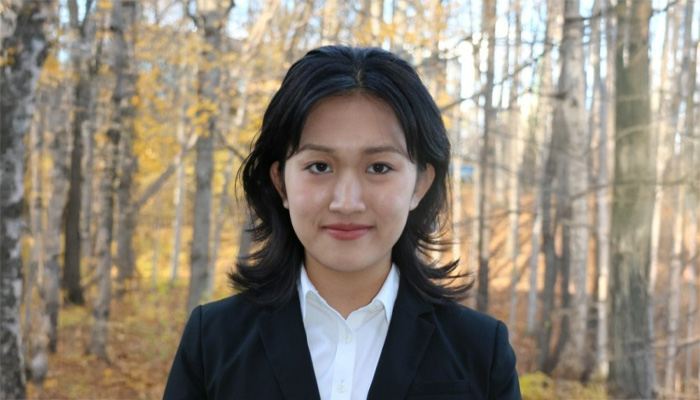 Sarah Smiling in a forest