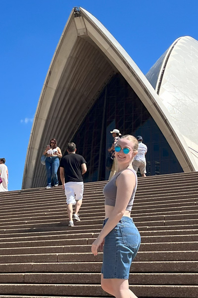 Sophie standing and smiling