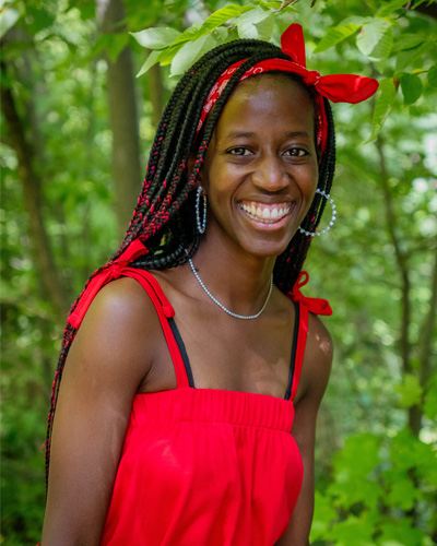 Elizabeth in a red dress smiling