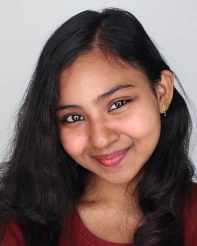 Idhaya Bency smiling