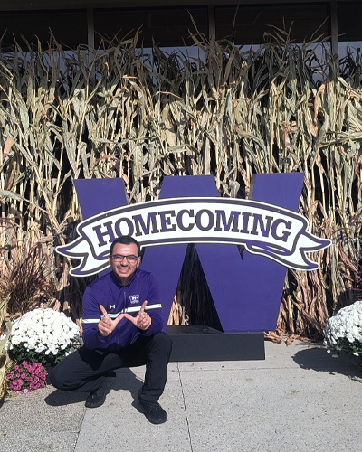 Jhonatan in front of the UCC on Homecoming 2025