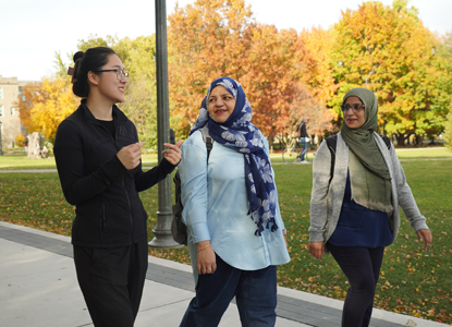 Graduate students walking together