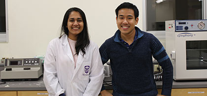 Toby Le and colleague in the lab